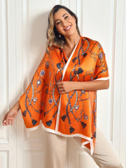 Women's orange mulberry silk printed rectangular long shawl scarf with chain and tassel pattern.