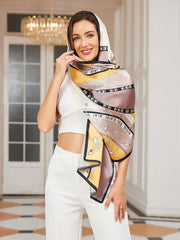 Women's mulberry silk printed rectangular long shawl scarf with elegant floral and geometric patterns.