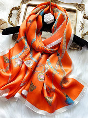 Orange mulberry silk printed rectangular long shawl scarf with chain and tassel pattern.
