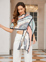 Women's mulberry silk printed rectangular long shawl scarf in peach, mint, and grey floral pattern.