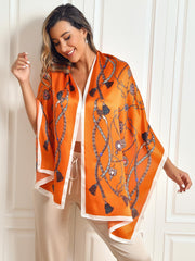 Women's mulberry silk rectangular long shawl scarf in orange with a chain and tassel print.