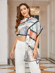 Women's mulberry silk printed rectangular long shawl scarf with floral and geometric patterns in peach, grey, and mint.