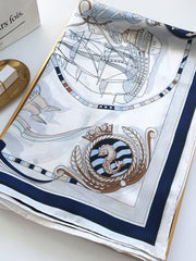 Mulberry silk square scarf with a blue and white nautical print featuring a ship and crest.