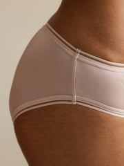 Light pink mulberry silk seamless panty with ultra-smooth mesh edge detail.