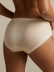 Nude mulberry silk seamless panty with ultra-smooth mesh edge detail, shown from the back.