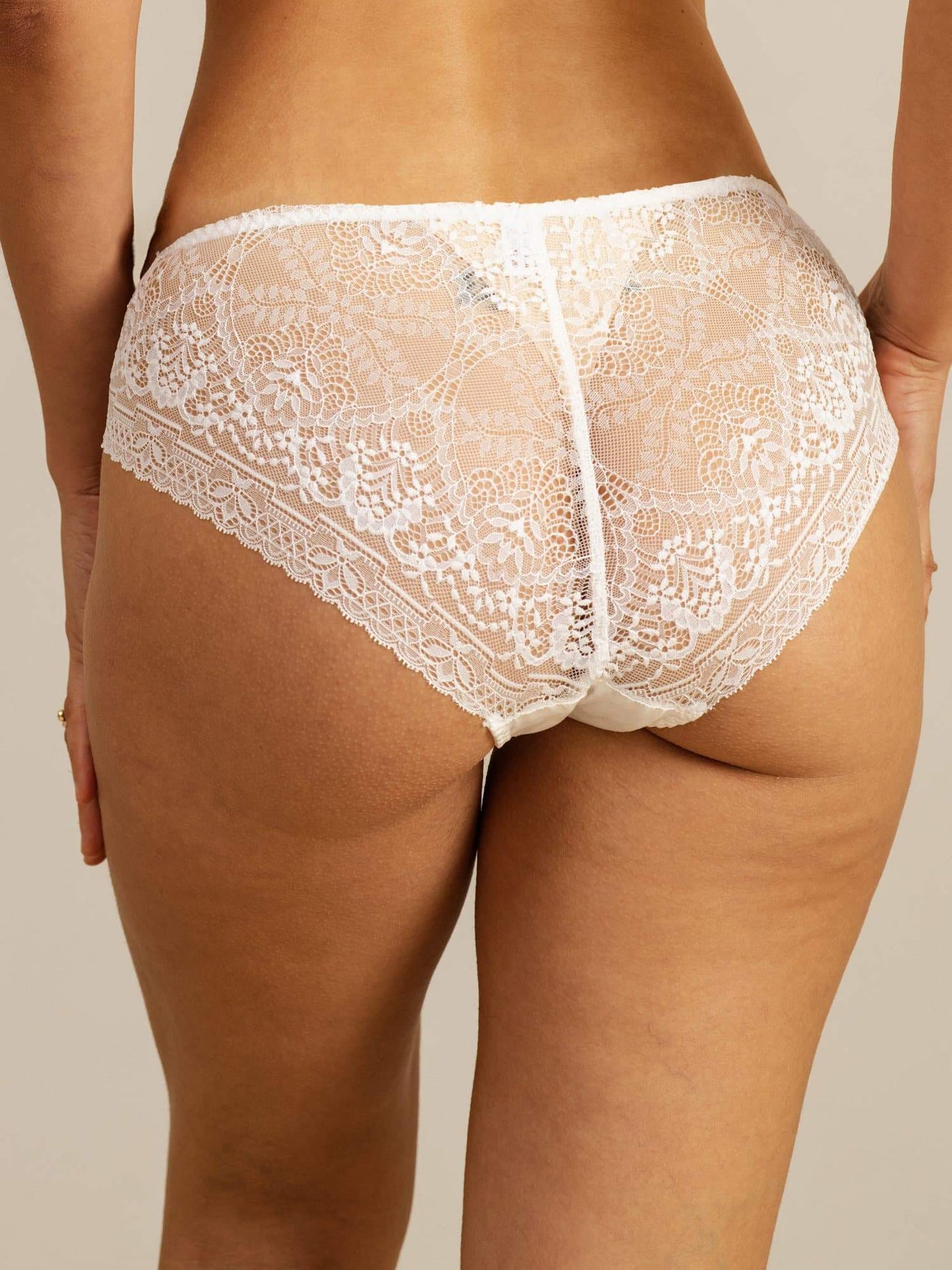 White mulberry silk lace panty with scalloped trim, shown from the back.