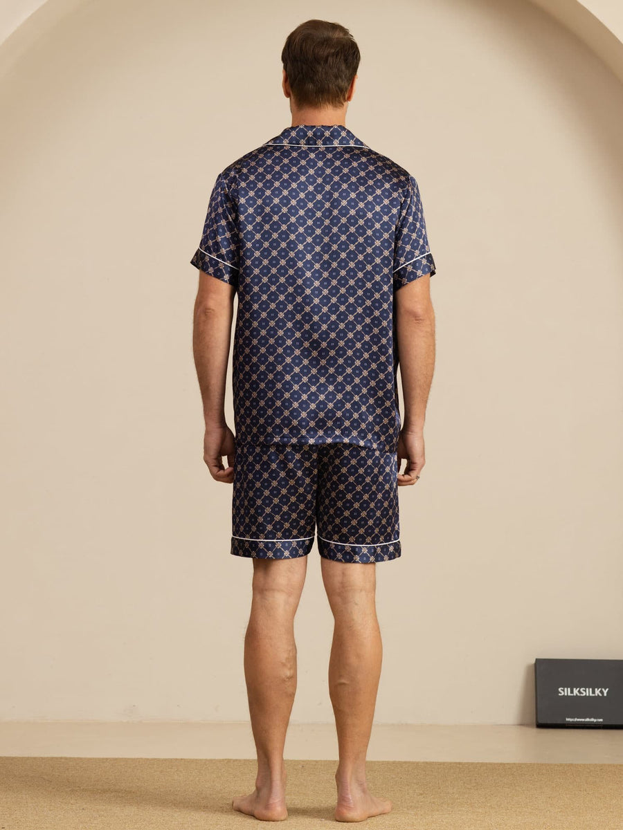 Men's mulberry silk short sleeve pajamas with blue chain print and white piping.