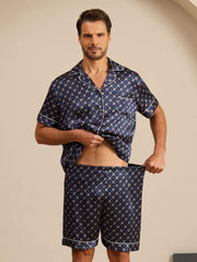 Men's mulberry silk short sleeve pajamas set in navy with a chain print and white piping.