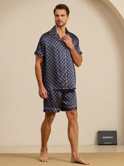 Men's mulberry silk short sleeve pajamas set with navy chain print and white piping.