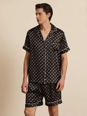 Men's black mulberry silk short sleeve pajamas with chain print and white piping.