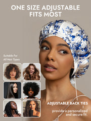 White mulberry silk sleep bonnet with blue floral pattern and adjustable back ties.