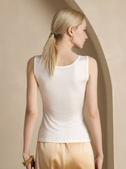 Women's ivory mulberry silk sleeveless round neck tank top with a smooth finish.