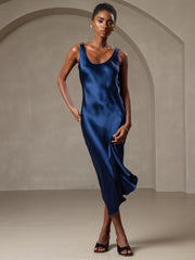 Navy blue mulberry silk sleeveless U-neck midi dress on a model.