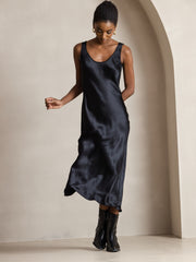 Black mulberry silk sleeveless U-neck midi long dress on a model.