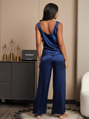 Women's navy blue mulberry silk sleeveless U-neck tank top and wide-leg pants pajama set.