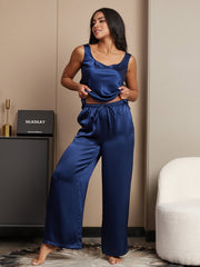 Women's navy blue mulberry silk sleeveless U-neck tank top and wide-leg pants pajama set.