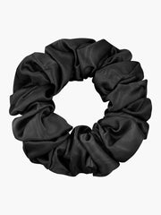 Black 100% Mulberry silk soft large hair scrunchie, 3.5cm wide, on a white background.