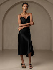 Black mulberry silk spaghetti strap cowl neck midi dress with a split design.