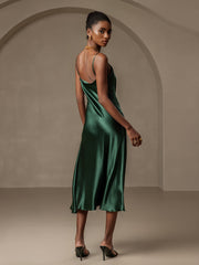 Women's emerald green mulberry silk cowl neck midi dress with spaghetti straps and split design.