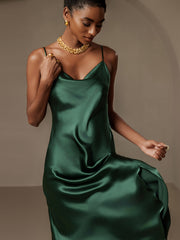 Women's emerald green mulberry silk cowl neck midi dress with spaghetti straps and split design.