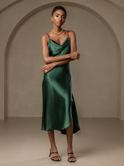 Women's emerald green mulberry silk cowl neck midi dress with spaghetti straps and split design.
