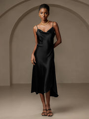Black mulberry silk spaghetti strap cowl neck bias midi dress with split design.