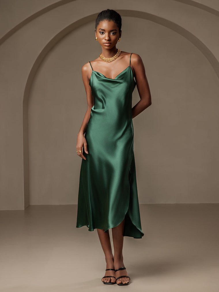 Dark green mulberry silk cowl neck midi dress with spaghetti straps and split design.