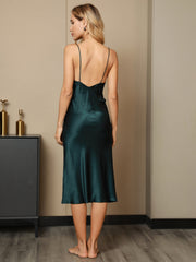Women's mulberry silk spaghetti strap deep V-neck midi dress in emerald green, featuring a V-back design.