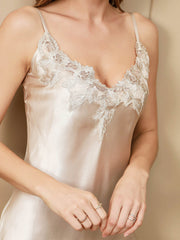 Champagne mulberry silk spaghetti strap nightgown with delicate lace trim.