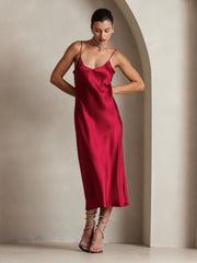 Red mulberry silk spaghetti strap midi dress with a subtle sheen.