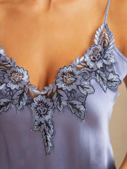 Mulberry silk spaghetti strap nightgown in lavender with intricate floral lace design.