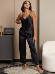 Women's black mulberry silk spaghetti strap V-neck cami and pants pajama set.