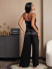 Women's black mulberry silk spaghetti strap cami and wide leg pants pajama set.