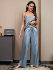 Women's mulberry silk spaghetti strap V-neck cami and wide-leg pants pajama set in dusty blue.