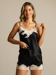 Women's black mulberry silk camisole and shorts set with white lace trim.