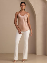 Women's blush mulberry silk spaghetti strap V-neck camisole top.
