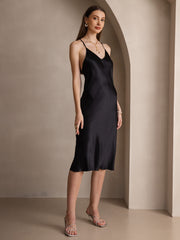 Black mulberry silk spaghetti strap V-neck midi dress with criss-cross back design.