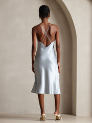 Light blue mulberry silk midi dress with spaghetti straps and criss-cross back design.