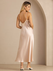 Women's blush pink mulberry silk spaghetti strap midi dress with lace V-back design.