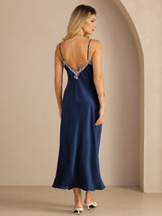 Women's navy mulberry silk midi dress with spaghetti straps and lace V-back design.
