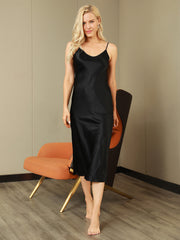 Black 100% Mulberry Silk Spaghetti Strap V-neck Midi Nightgown on a woman, standing.