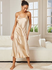 Women's champagne mulberry silk spaghetti strap V-neck midi nightgown.