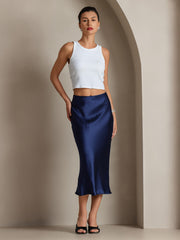 Navy blue 100% Mulberry silk stretch long straight skirt on a woman.