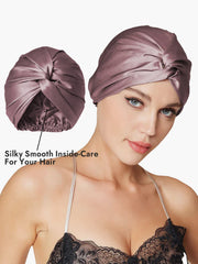 Mulberry silk turban in dusty rose with a knot-front design, shown on a model and close-up of smooth interior.