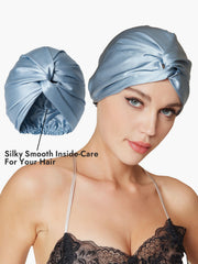 Light blue mulberry silk turban for sleeping with a knot-front design, shown on a woman and in detail.