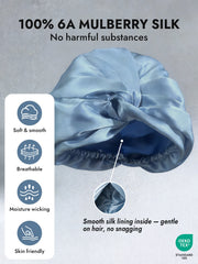 Light blue mulberry silk turban with knot-front style, smooth lining, and elastic band for sleeping.