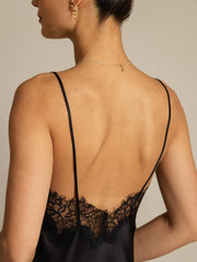 Black mulberry silk slip dress with delicate lace trim on the back.