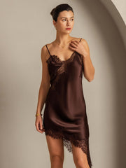 Brown mulberry silk slip dress with lace trim, V-neck, and asymmetrical hem.