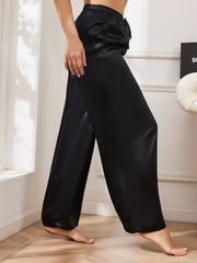 Black 100% Mulberry Silk wide leg women's pants with a drawstring waist.