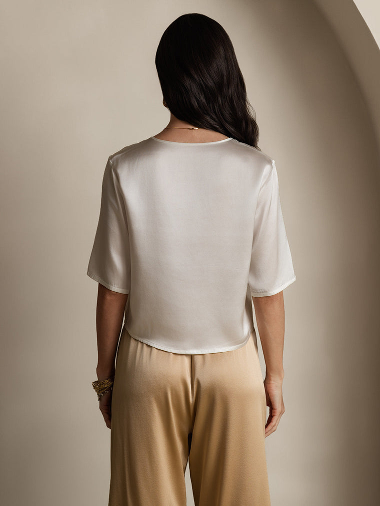 Women's white mulberry silk short sleeve boxy crop top with a subtle sheen.